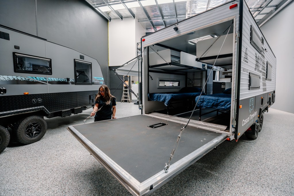 Spacious garage area inside The Toy Traveller toy hauler caravan