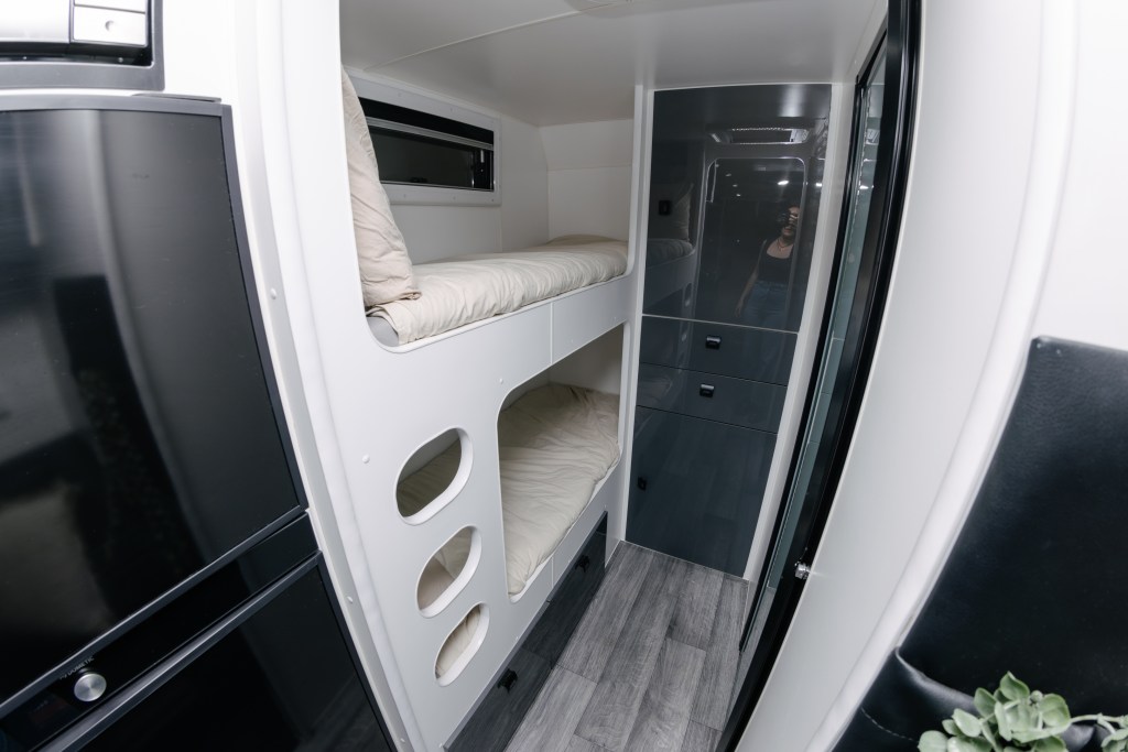Spacious interior of The Weekender caravan with full kitchen and bathroom