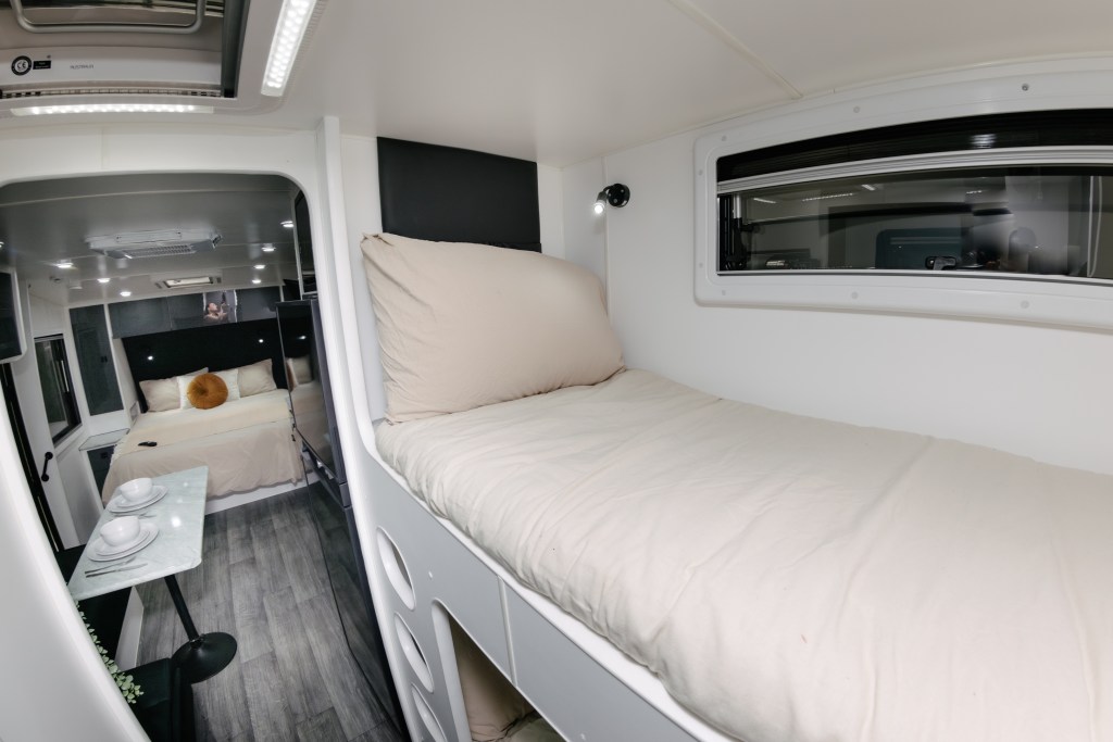 Spacious interior of The Weekender caravan with full kitchen and bathroom
